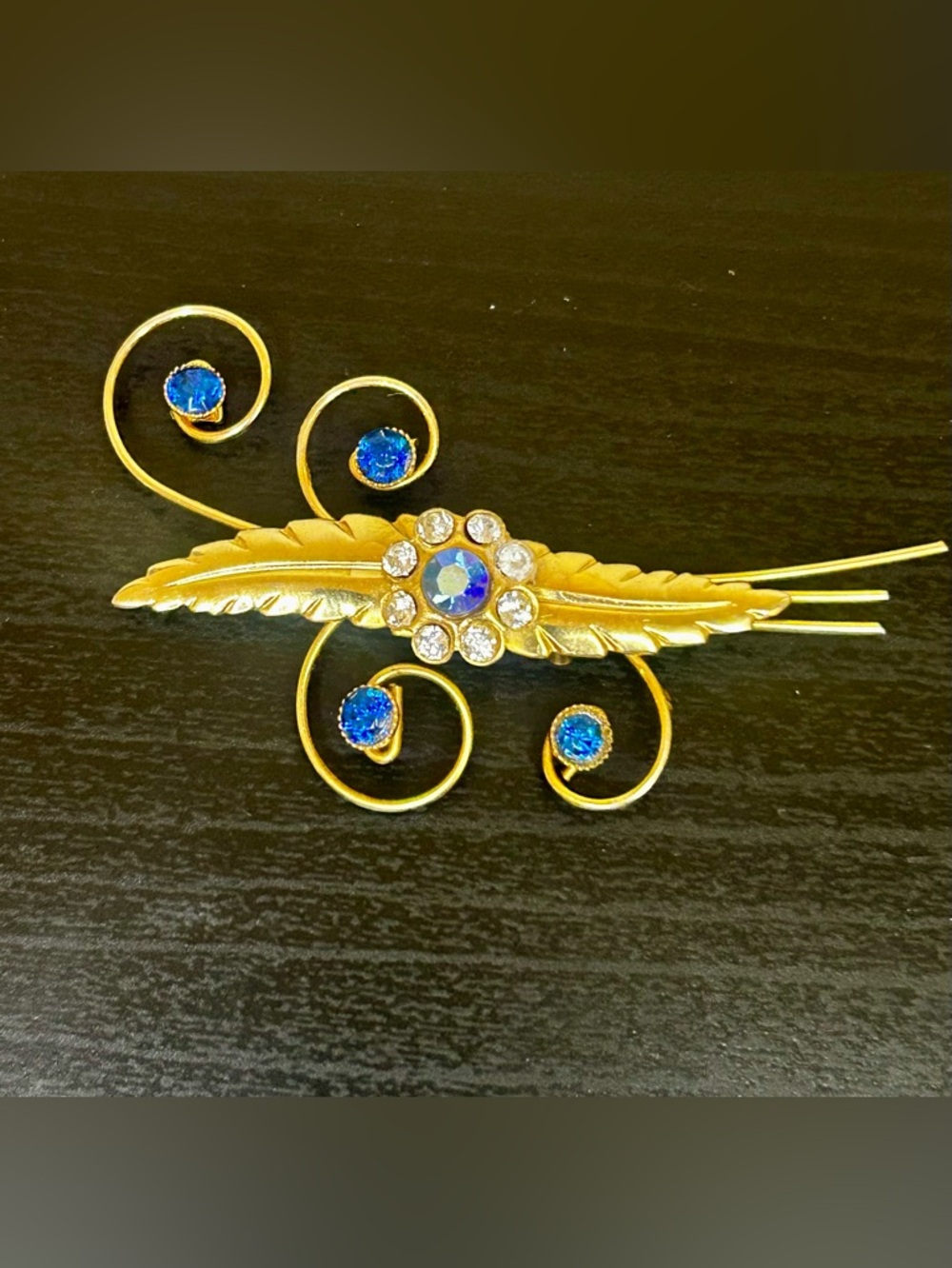 Gold-Tone Brooch with Blue Crystal Accents